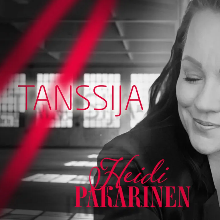 Heidi Pakarinen, Tanssija (Maniac) levyn kannessa on hämyinen tanssisali ja etualalla Heidi itse.